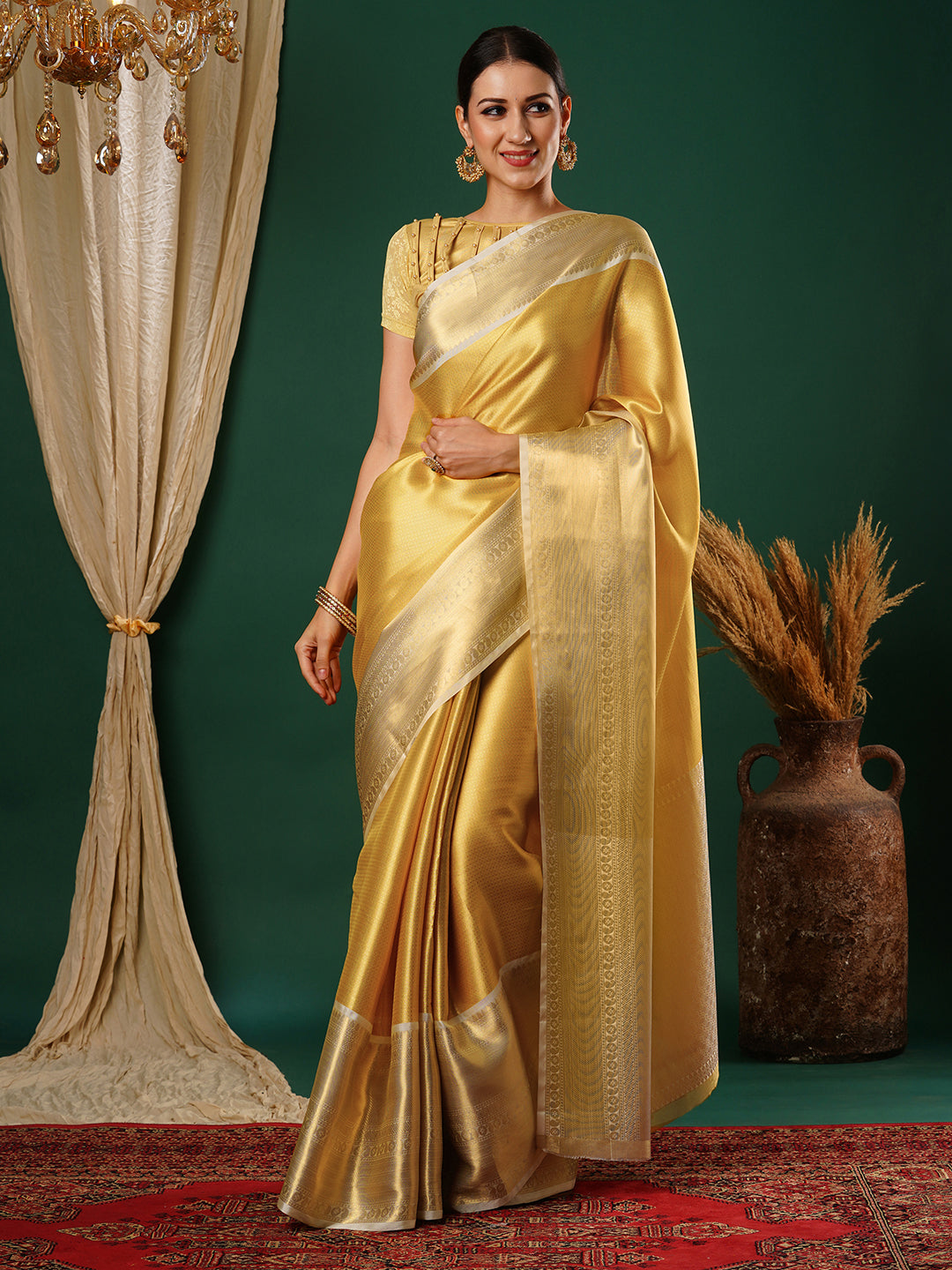 Women's Handloom Banarasi Solid gold saree with broad Zari Border